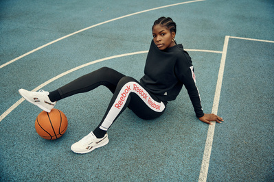 girl-wearing-reebok-sat-basketball-court-shot-by-matthew-stansfield