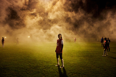 under-armour-girl-smoke-night-football-pitch-photo-by-matthew-stansfield