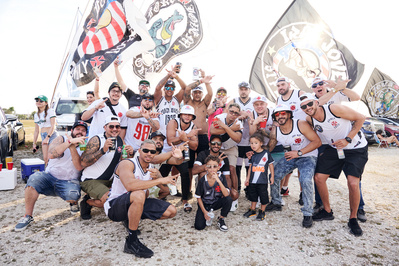 group-supporters-game-flags-shot-by-matthew-stansfield