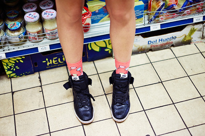 pair-nike-trainers-supermarket-floor-shot-by-matthew-stansfield