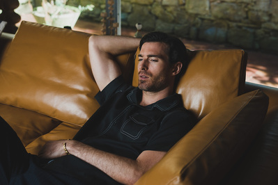 man-thinking-sofa-retro-shot-by-matthew-stansfield