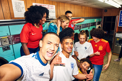 group-friends-selfie-football-shirts-launderette-shot-by-matthew-stansfield