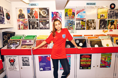 girl-wearing-football-shirt-record-shop-shot-by-matthew-stansfield