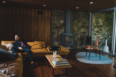 man-relaxing-sofa-retro-shot-by-matthew-stansfield
