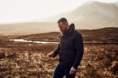 man-walking-isle-of-skye-landscape-photography-by-matthew-stansfield