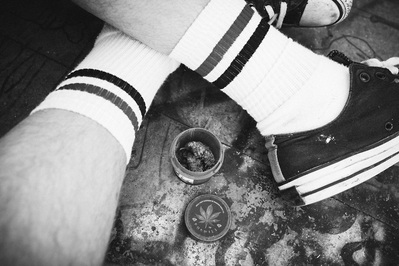 trainers-socks-crossed-weed-shot-by-matthew-stansfield