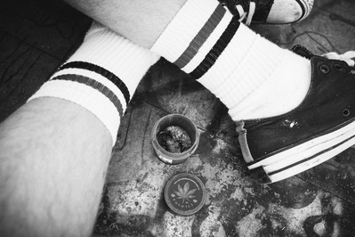 trainers-socks-crossed-weed-shot-by-matthew-stansfield