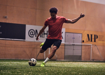 trent-alexander-arnold-kicking-football-shot-by-matthew-stansfield