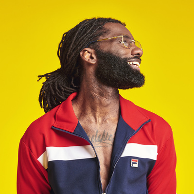 jacamo-wretch32-smiling-tattoo-glasses-shot-by-matthew-stansfield