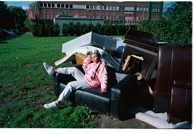 girl-sitting-sofa-fly-tipping-shot-by-matthew-stansfield