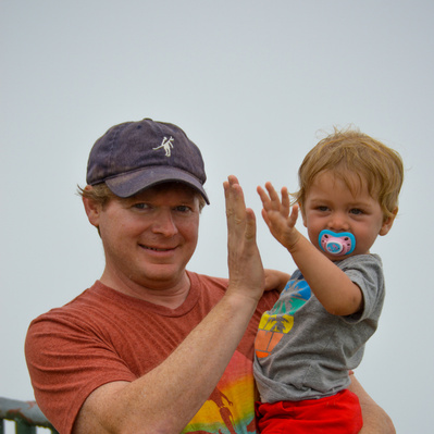 father son doing a high five Uniquely Created Photography wedding photographer based in Columbus, Ohio. 