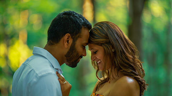 Wedding Photographer-Uniquely Created Photography. Engagement portrait at Innis Woods Metro Park, man and woman heads touching