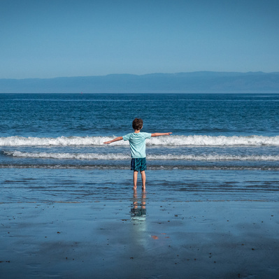 boy at the beach Uniquely Created Photography wedding photographer based in Columbus, Ohio. 