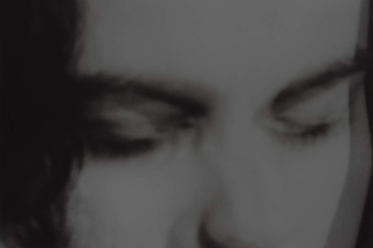 A woman with closed eyes. 