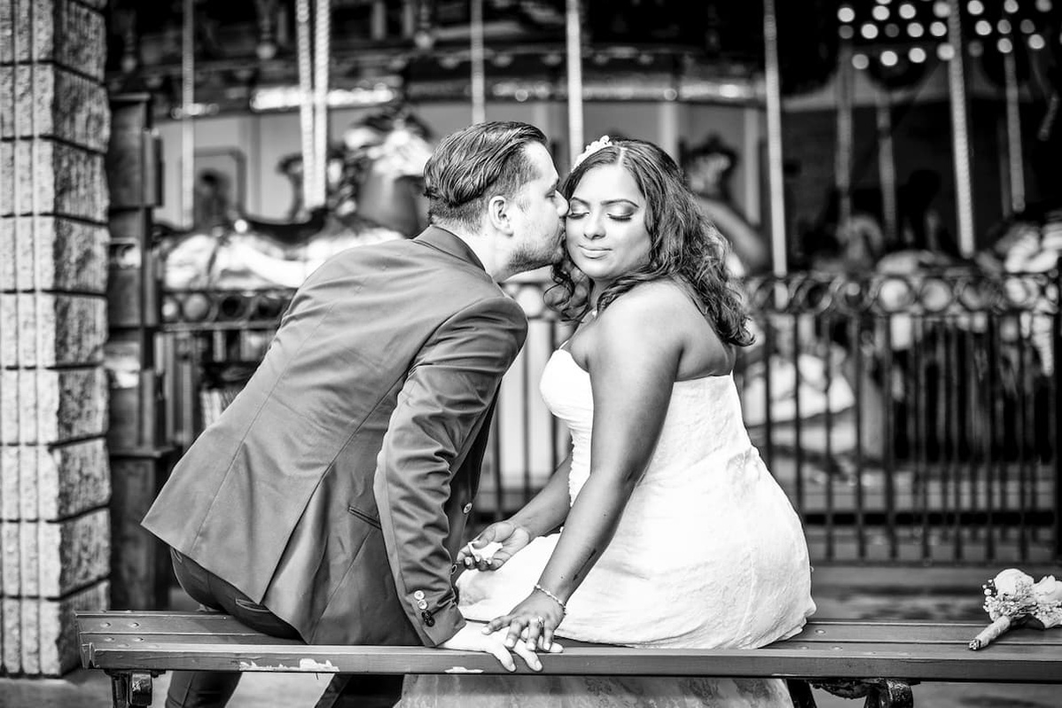 Wedding Couple having Fun on the carnival at Willowbrook Park in Staten Island NYC
