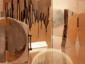 Hinged wooden tidal journal sculptures with circular form, reclaimed coastal materials, Cornwall. Mentawaai Islands. Split panel holds time and erosion from tidal drawing practice.