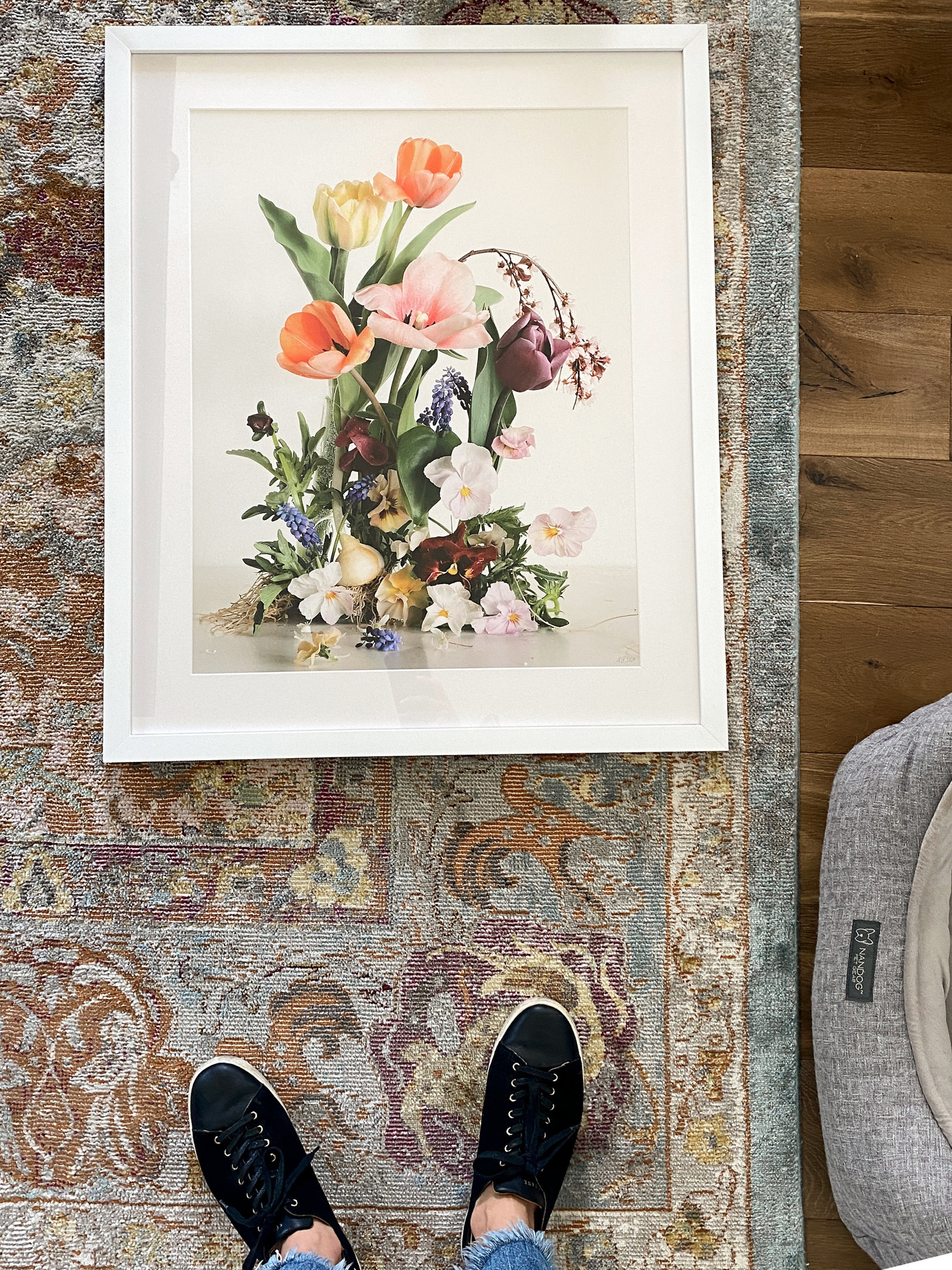 Top down image of flower still life framed print. 