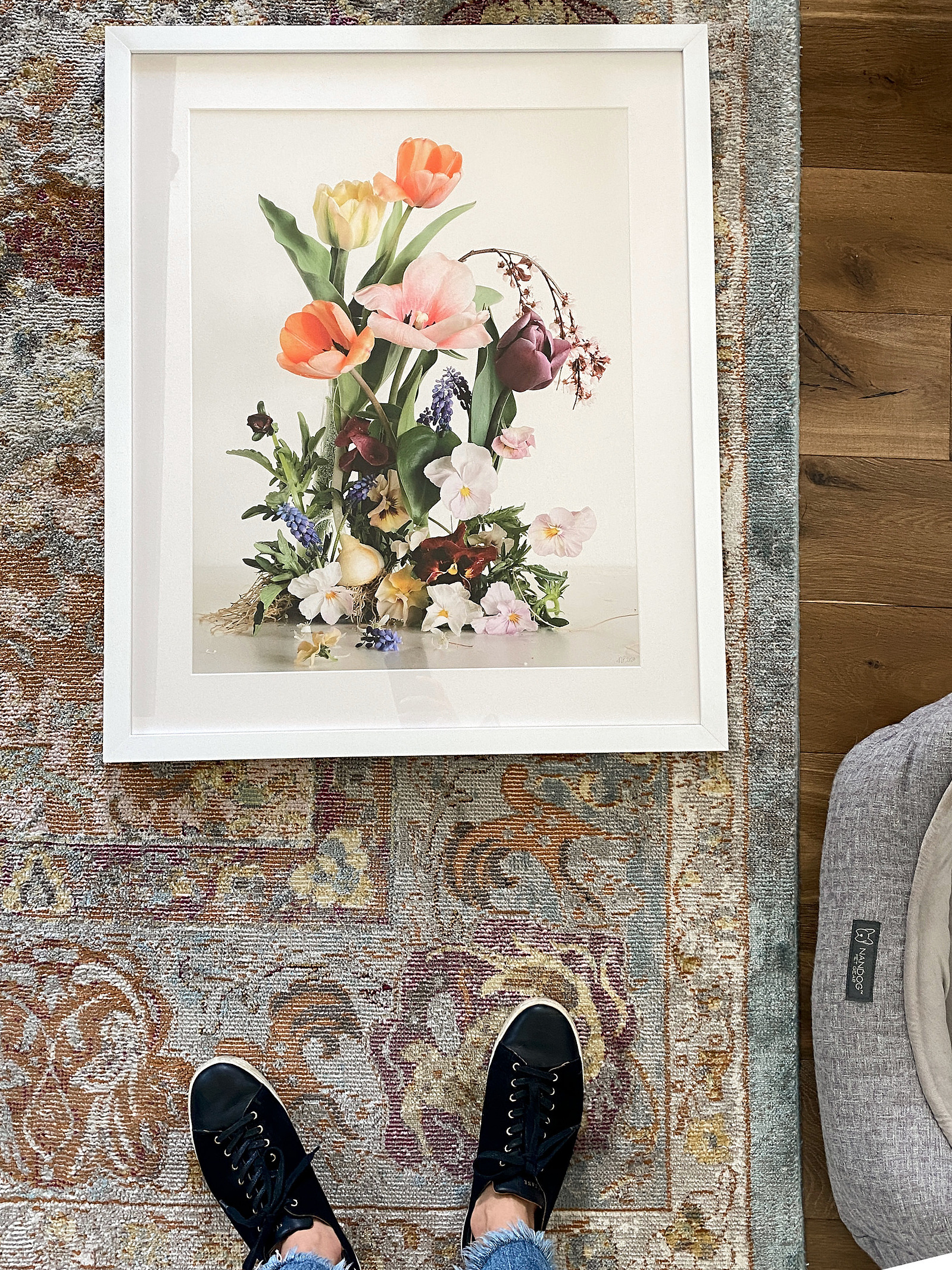 Top down image of flower still life framed print. 