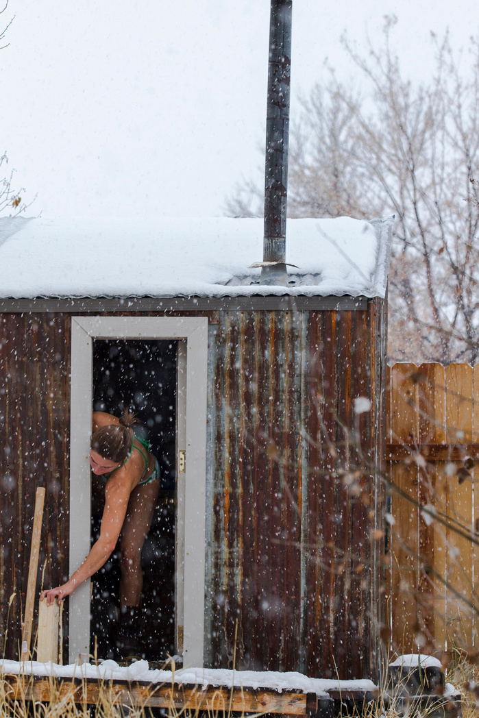 Anne Gilbert Chase enjoying the backyard sauna on a winter day.