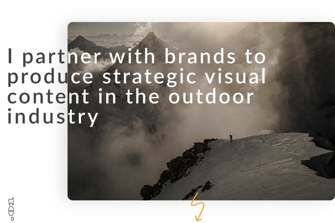 An image of a tiny person on a huge mountain ridge with bad weather coming in. The image includes text overlay that is an ad for a Montana-based outdoor commercial photographer on their website landing page. 