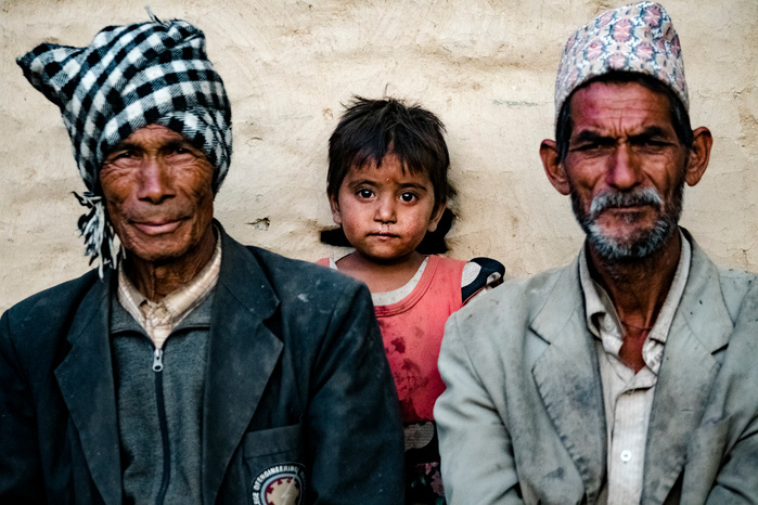 Two local Nepalese men and a girl