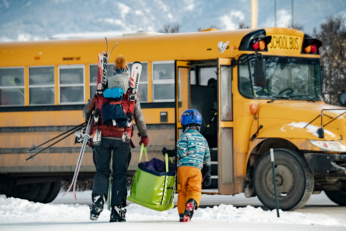 Off to ski school in the ski bus outside of Bozeman Montana en route to Bridger Bowl