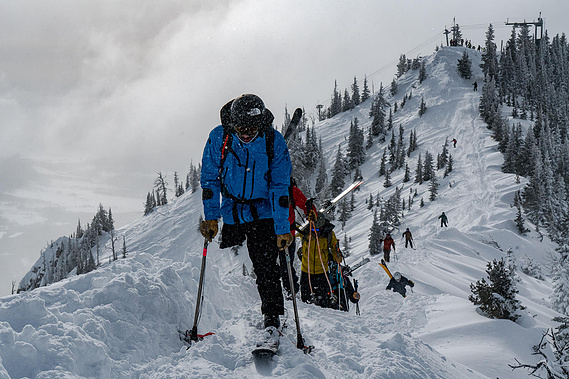 Vasu Sojitra hiking to the north at the bridger bowl ski area on a cold and snowy winter day in bozeman, montana.  