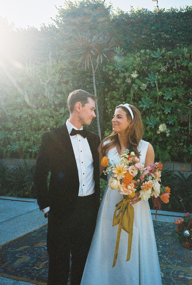 Stunning bride and groom shot on film at The SmogShoppe, captured by Abigail Gorden Photography. A timeless and elegant wedding moment.