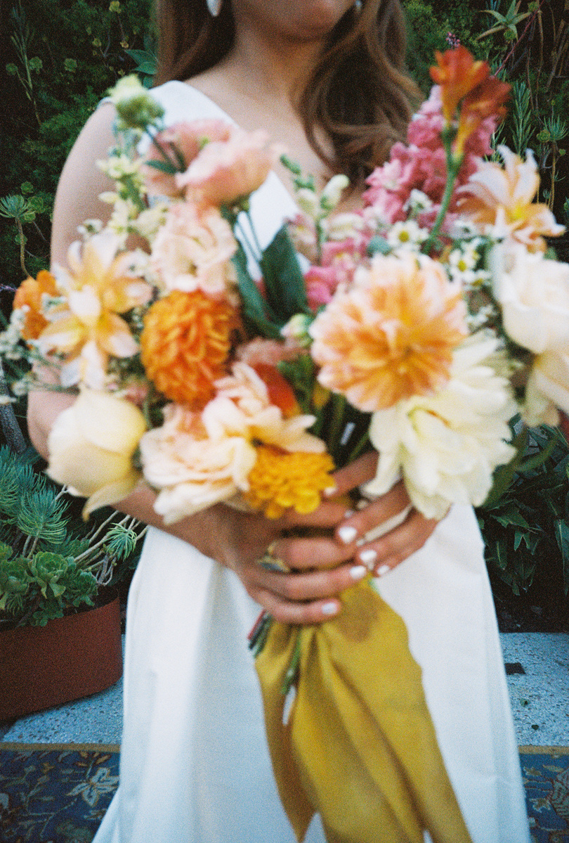 Stunning bouquet detail shot on film at The SmogShoppe, captured by Abigail Gorden Photography. A timeless and elegant wedding moment.