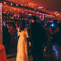Bride and groom wedding photography celebrating their wedding day on the dance floor.