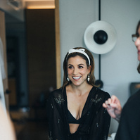 Candid bride getting ready.