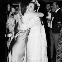 Elegant black and white flash wedding photography shot at Duke's Malibu, CA by wedding photographer Abigail Gorden.