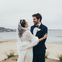 Wedding photography of a first look moment with bride and groom shot in Malibu, California.