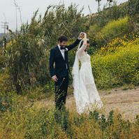 Romantic wedding photography of a bride and groom amongst coastal scenery in Malibu, CA shot by wedding photographer Abigail Gorden Photography.