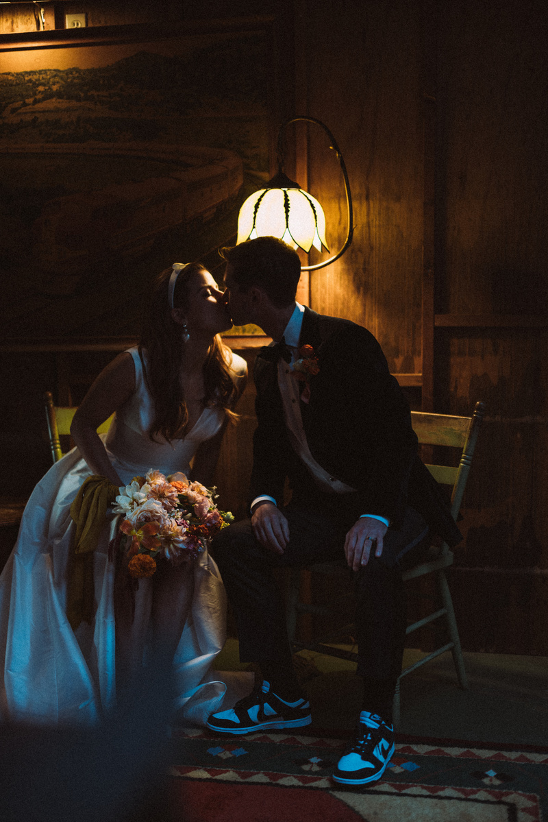 Intimate kissing shot of bride and groom, captured by Abigail Gorden Photography. A romantic and heartfelt moment on their wedding day.