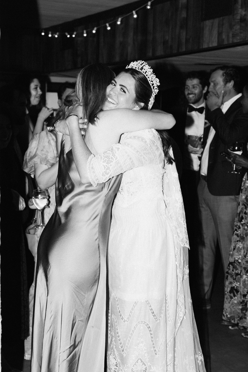 Elegant black and white flash wedding photography shot at Duke's Malibu, CA by wedding photographer Abigail Gorden.