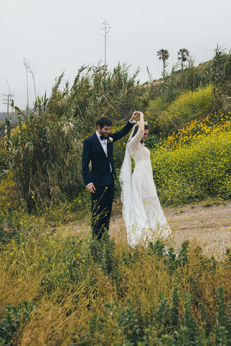 Romantic wedding photography of a bride and groom amongst coastal scenery in Malibu, CA shot by wedding photographer Abigail Gorden Photography.