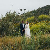 Romantic wedding photography of a bride and groom amongst coastal scenery in Malibu, CA shot by wedding photographer Abigail Gorden Photography.