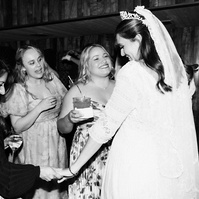 Elegant black and white flash wedding photography shot at Duke's Malibu, CA by wedding photographer Abigail Gorden.