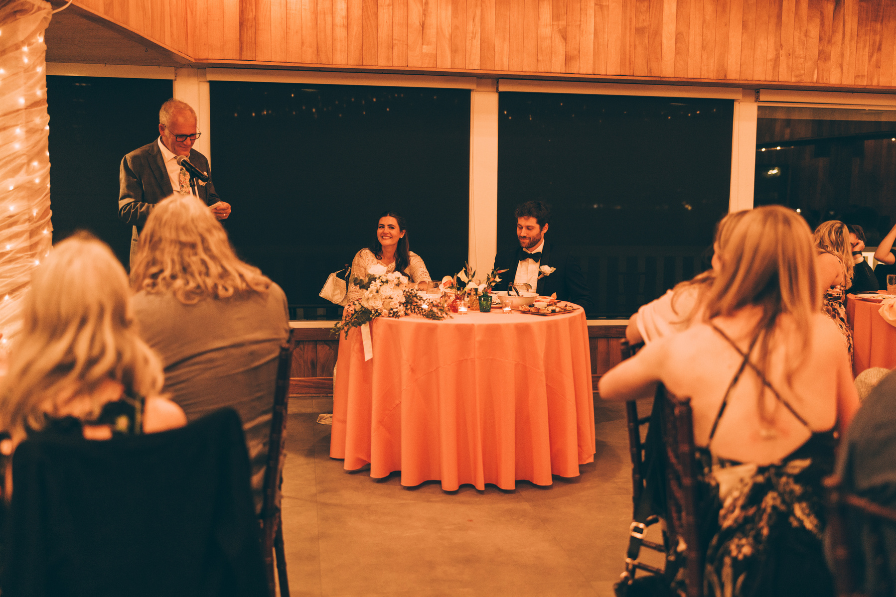 Wedding photography of the father of the bride giving a speech to the newly weds on their wedding day at Duke's Malibu.