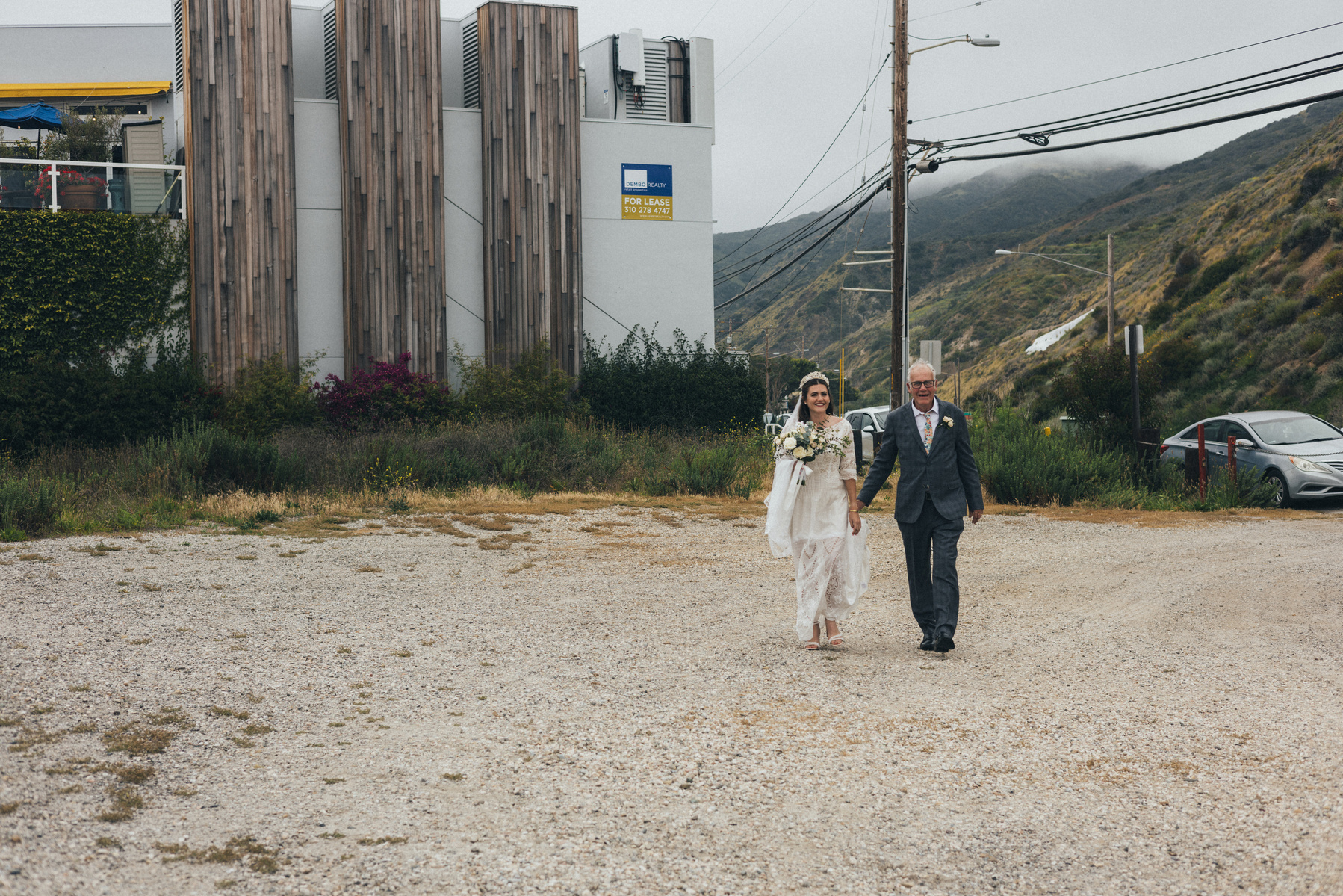 Wedding photography of dad walking his daughter the bride on her wedding day.