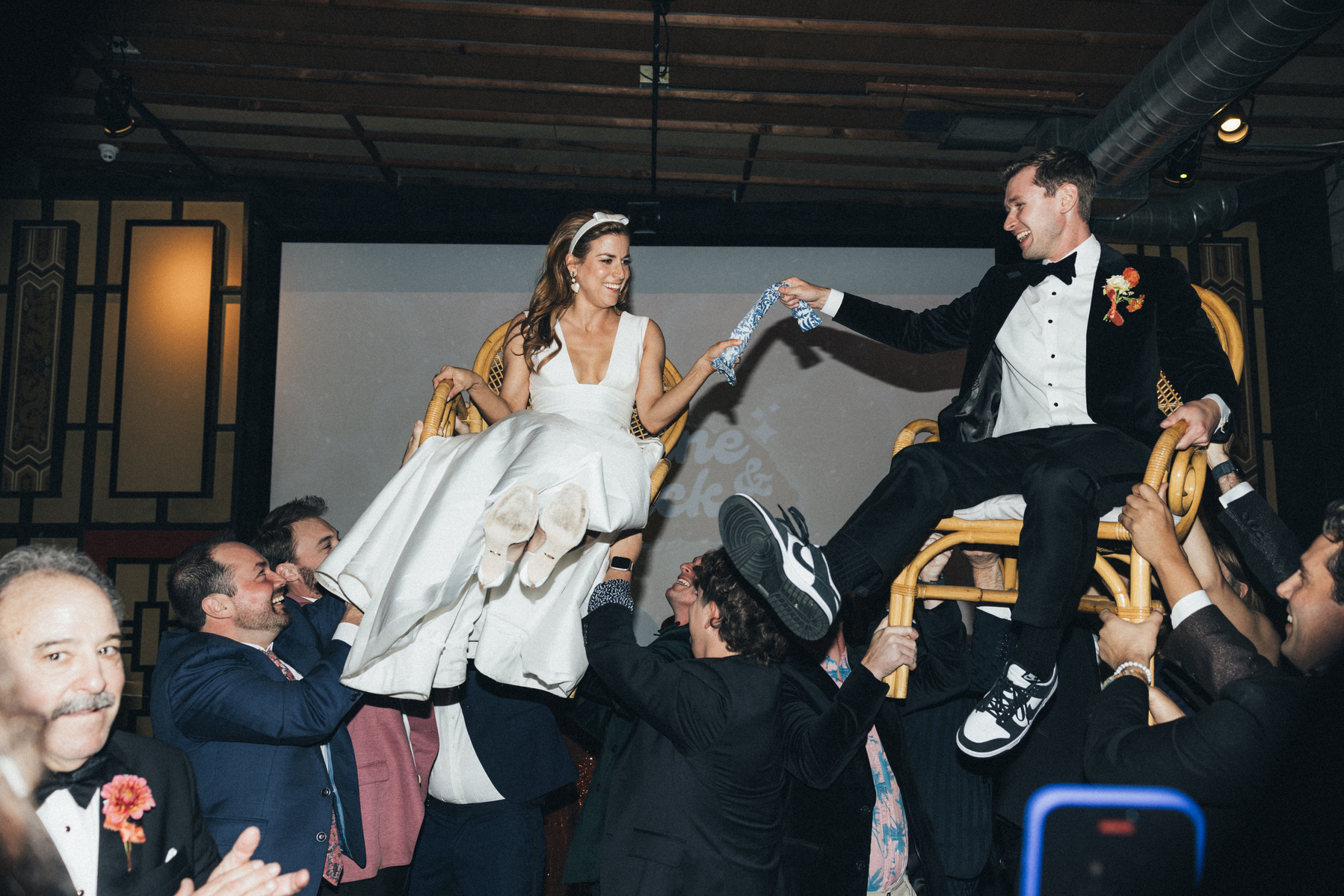 Candid energetic hora dance at the wedding, captured by Abigail Gorden Photography. A lively and joyful celebration of love and Jewish tradition.