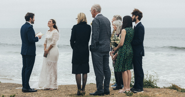 Family wedding photography with the coastal backdrop of Malibu Beach. 