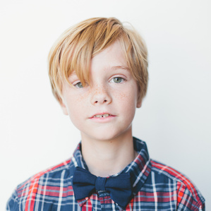 Boy with freckles and bowtie