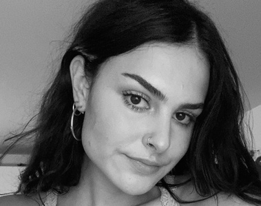 A monochrome portrait of Claudia Menecola