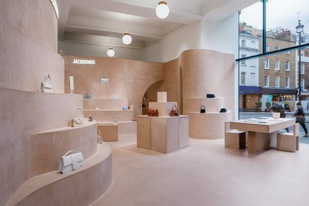 store interior made of terracruda with soft round edges and shapes. custom made pieces of furniture and product display.