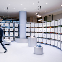 Man walking past a box system designed as a pop-up