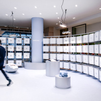Man walking past a box system designed as a pop-up