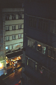 street scene, people, between buildings, vantage point, bar, low light, night time, hong-kong