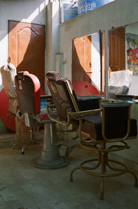 lyari, barber chairs, mirrors, lyari girls café, leather chairs, day light, pakistan